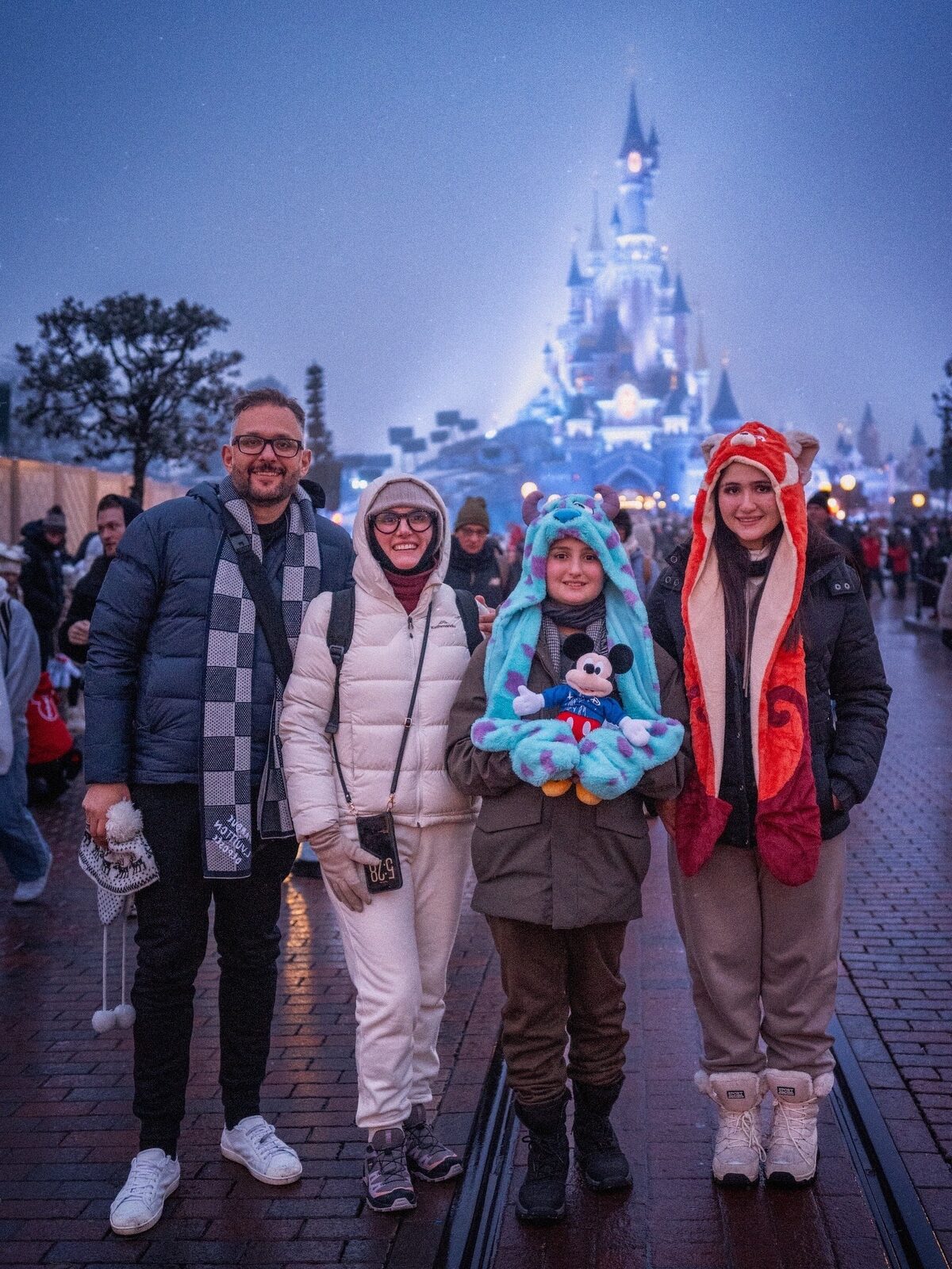 The whole crew at Disneyland Paris — cold but worth it